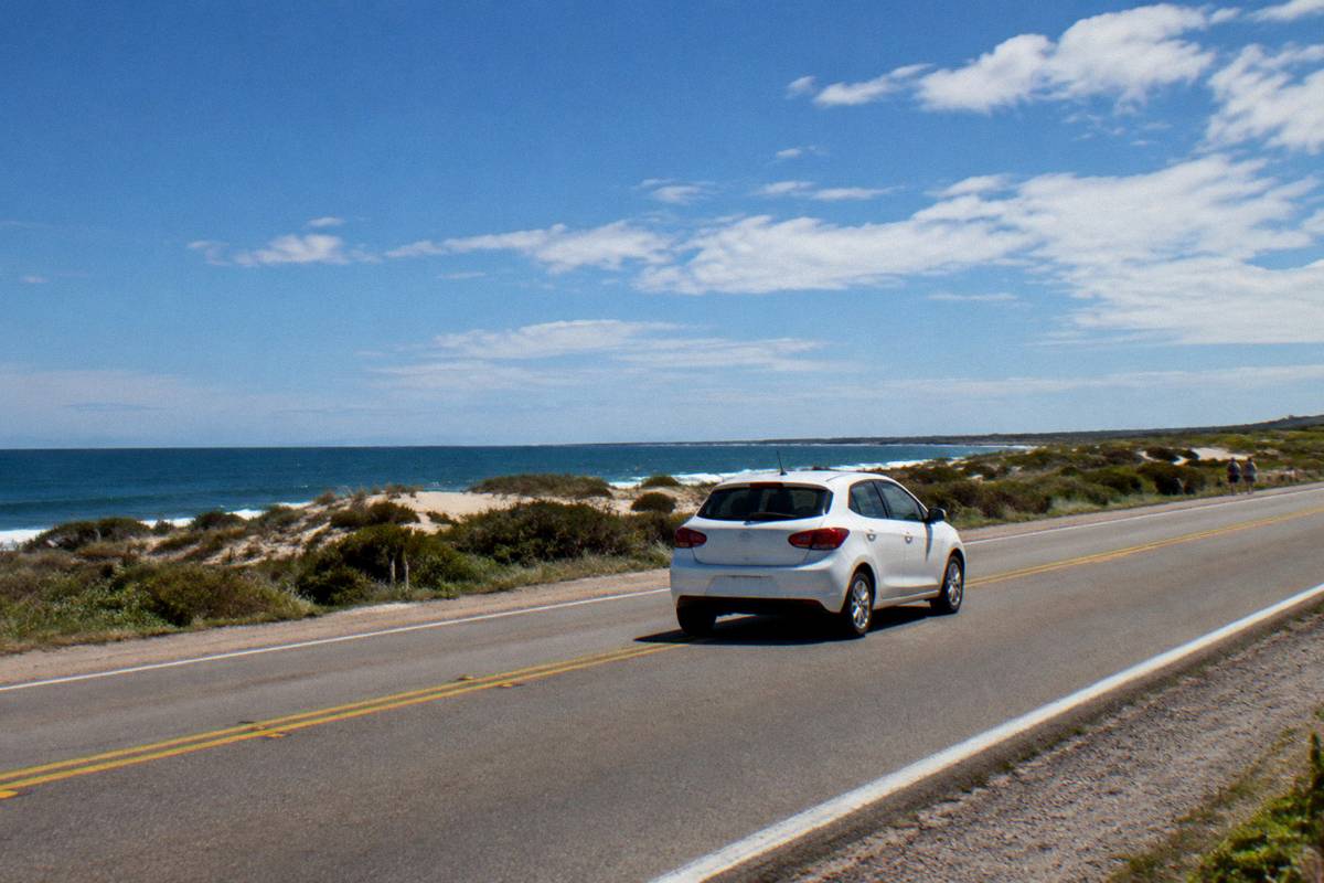 A small car on a coastal highway east of Montevideo